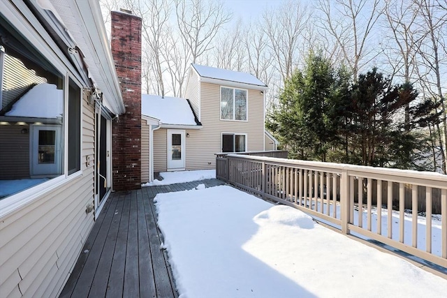 view of snow covered deck