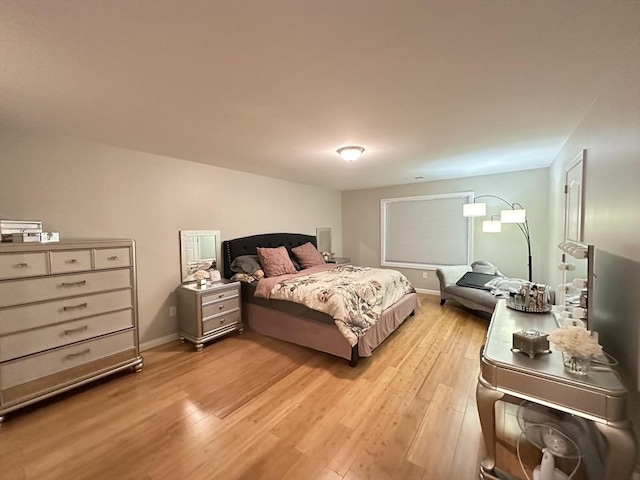 bedroom featuring light wood-type flooring