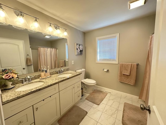 bathroom with a shower with curtain, vanity, and toilet