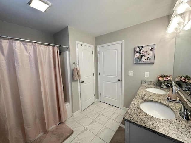 bathroom with vanity and shower / tub combo with curtain