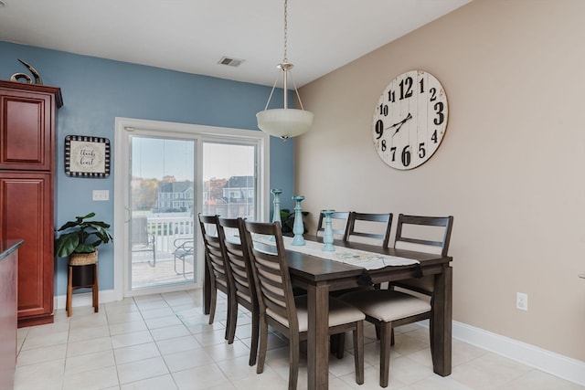 view of tiled dining space