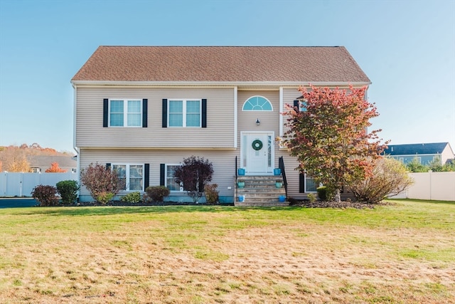 view of front of home featuring a front yard