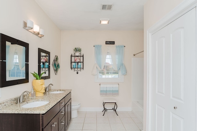 full bathroom with vanity, tile patterned flooring, toilet, and shower / bath combination