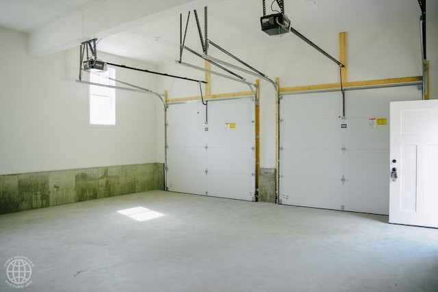 garage featuring a garage door opener