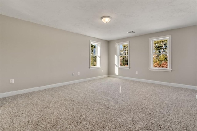77 Minot Ave, Wareham, MA 02571 - spare room featuring baseboards, healthy amount of natural light, and carpet flooring