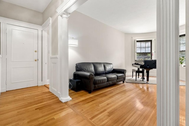 149 Winthrop Rd Unit 5, Brookline, MA 02445 - entryway featuring ornate columns and light wood-style floors