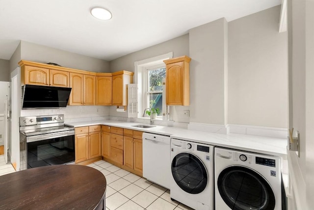 149 Winthrop Rd Unit 5, Brookline, MA 02445 - laundry room with washer and dryer and light tile patterned floors