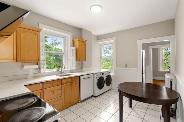 149 Winthrop Rd Unit 5, Brookline, MA 02445 - kitchen featuring white dishwasher, a sink, light countertops, electric stove, and light tile patterned floors