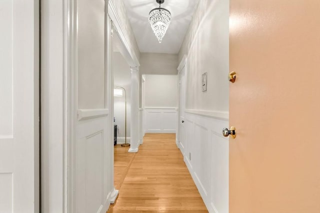 149 Winthrop Rd Unit 5, Brookline, MA 02445 - hall featuring light wood finished floors and a chandelier