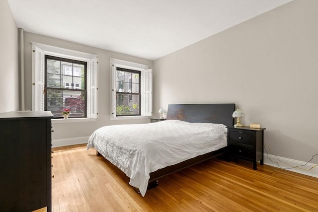 149 Winthrop Rd Unit 5, Brookline, MA 02445 - bedroom with baseboards and light wood finished floors