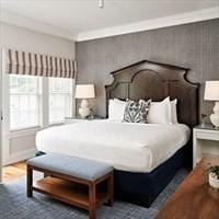 bedroom featuring wood finished floors