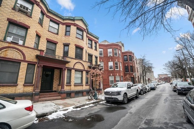 view of road with sidewalks and curbs