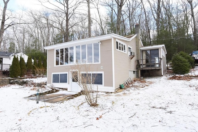 exterior space featuring a sunroom