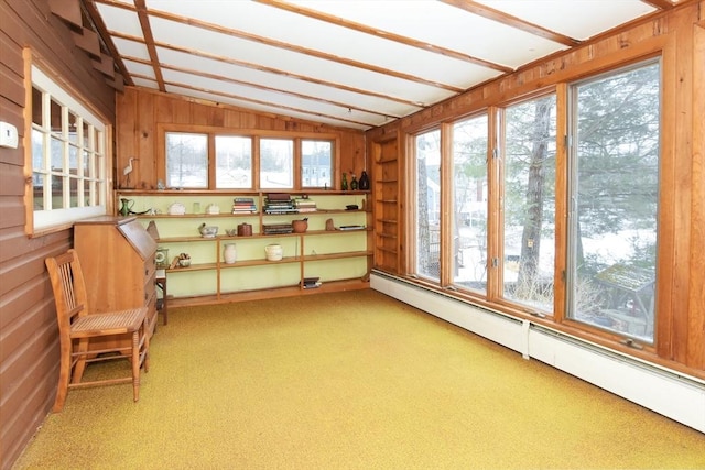 unfurnished sunroom with a baseboard radiator and lofted ceiling