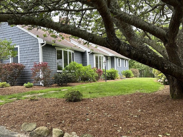 21 Friends Ln, Dennis, MA 02660 - view of front of property featuring a front yard