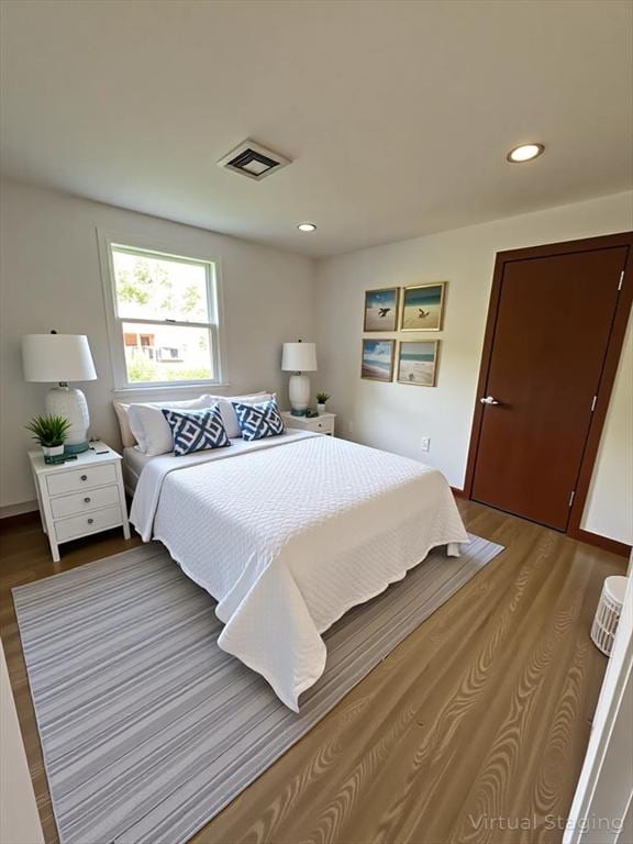 21 Friends Ln, Dennis, MA 02660 - bedroom featuring wood finished floors and recessed lighting
