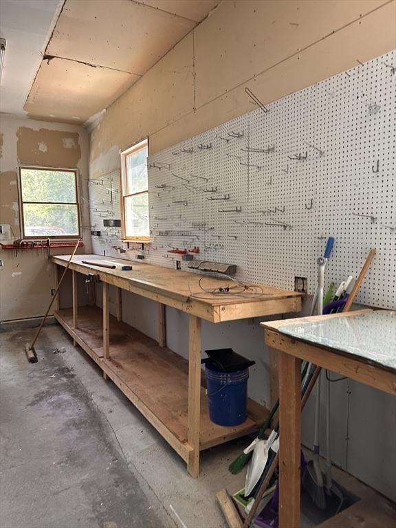 21 Friends Ln, Dennis, MA 02660 - misc room with a workshop area and unfinished concrete flooring