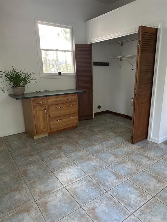 21 Friends Ln, Dennis, MA 02660 - unfurnished bedroom with a closet and baseboards