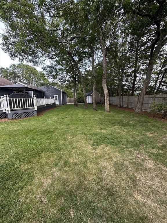 21 Friends Ln, Dennis, MA 02660 - view of yard with a deck and a storage shed