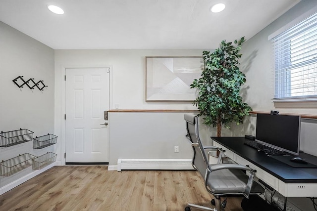 home office featuring baseboards, a baseboard heating unit, wood finished floors, and recessed lighting