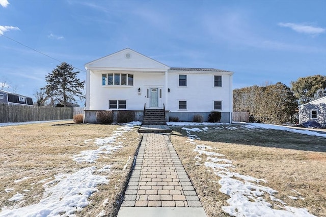 split foyer home with fence