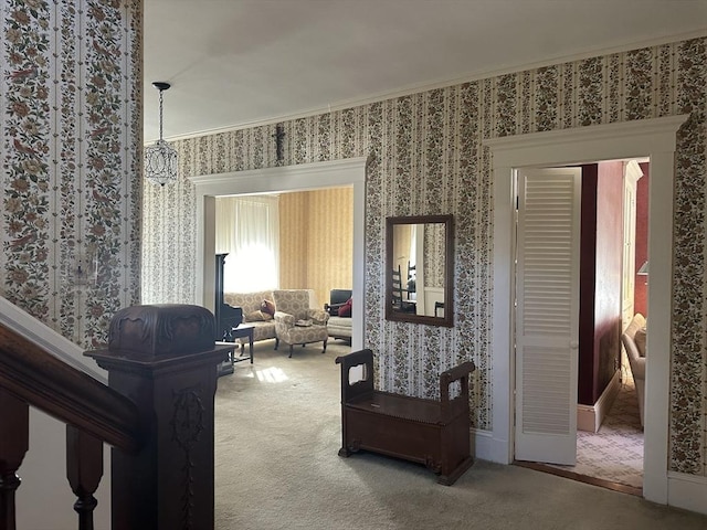 living room with carpet floors and ornamental molding