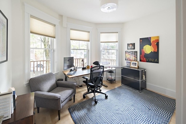 office area featuring hardwood / wood-style floors