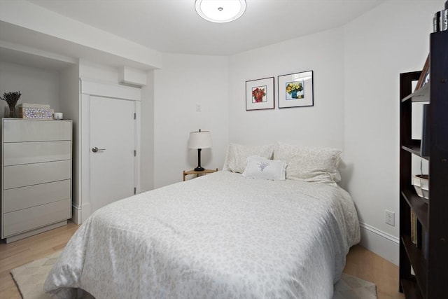 bedroom featuring light hardwood / wood-style floors