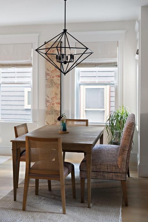 dining space featuring hardwood / wood-style flooring