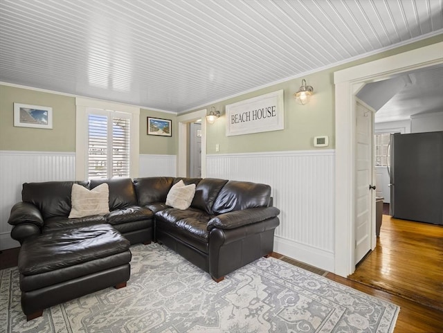 5 Adams St, Littleton, MA 01460 - living area with wainscoting, crown molding, and hardwood / wood-style flooring