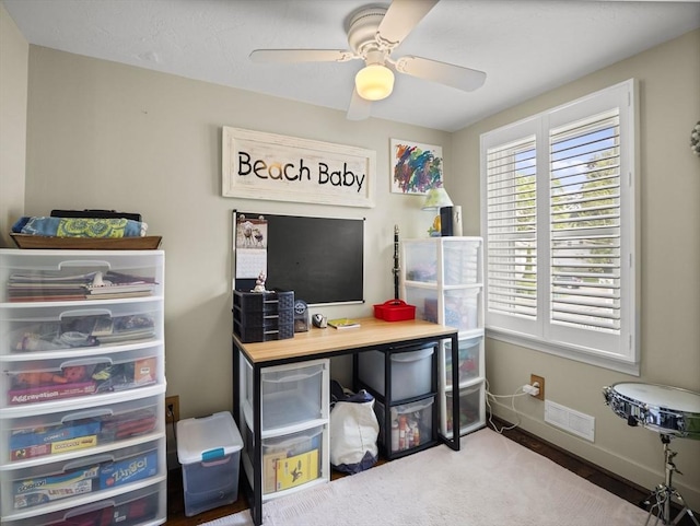 5 Adams St, Littleton, MA 01460 - carpeted home office with a ceiling fan and baseboards