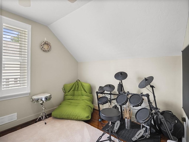 5 Adams St, Littleton, MA 01460 - playroom with vaulted ceiling, baseboards, wood finished floors, and ceiling fan
