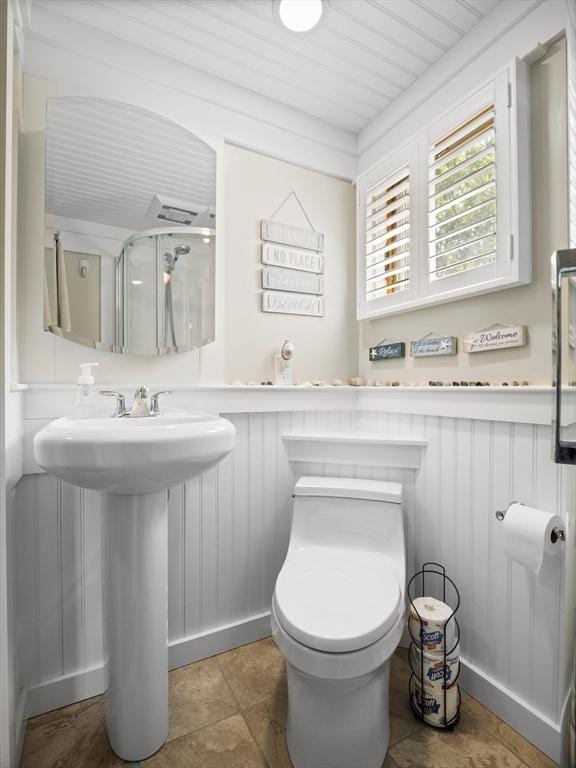 5 Adams St, Littleton, MA 01460 - bathroom featuring a shower stall, toilet, wainscoting, a sink, and wood ceiling
