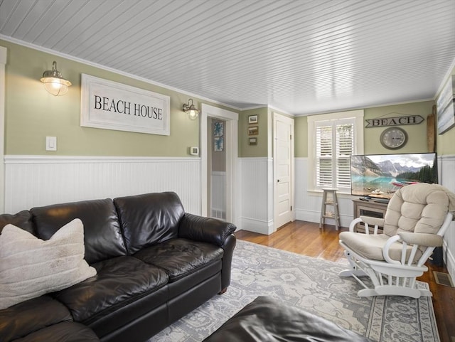5 Adams St, Littleton, MA 01460 - living room with a wainscoted wall, wood finished floors, and ornamental molding