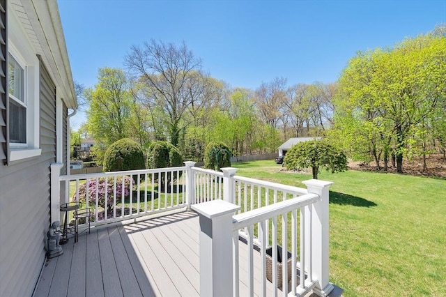 wooden deck with a yard