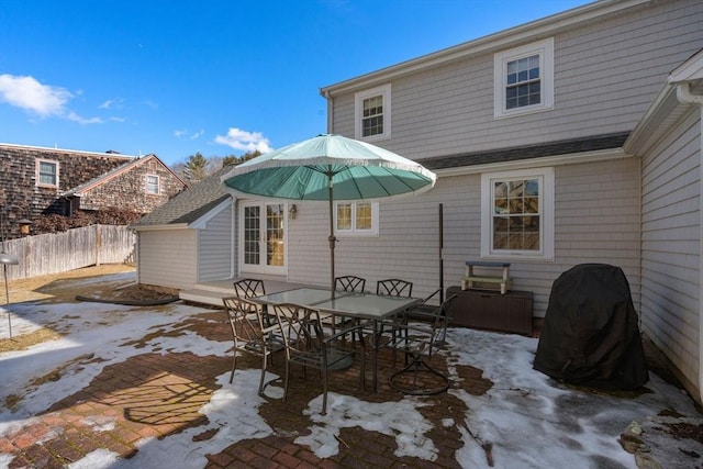 view of patio / terrace featuring fence