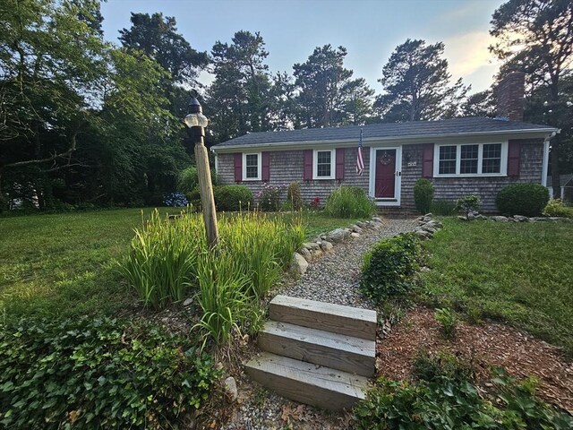 3 Kenneth St, Sandwich, MA 02537 - view of front facade with a chimney and a front lawn