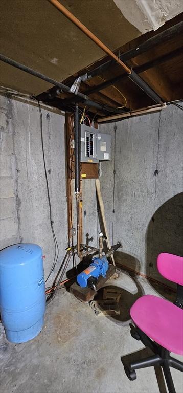 3 Kenneth St, Sandwich, MA 02537 - unfinished below grade area featuring a water pressure tank and electric panel