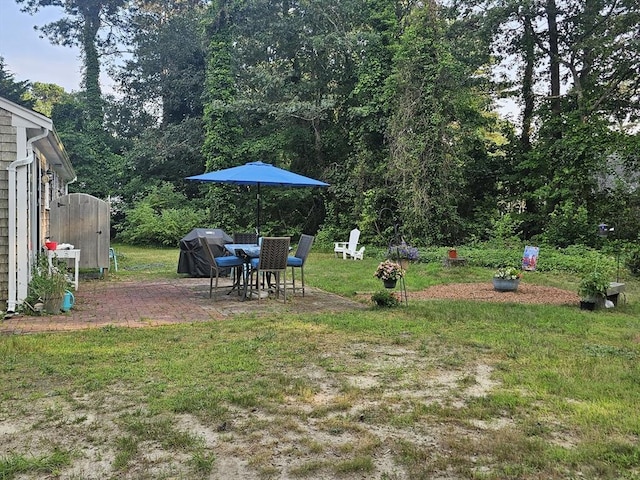 3 Kenneth St, Sandwich, MA 02537 - view of grassy yard featuring a patio