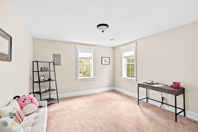 sitting room with visible vents, baseboards, and carpet