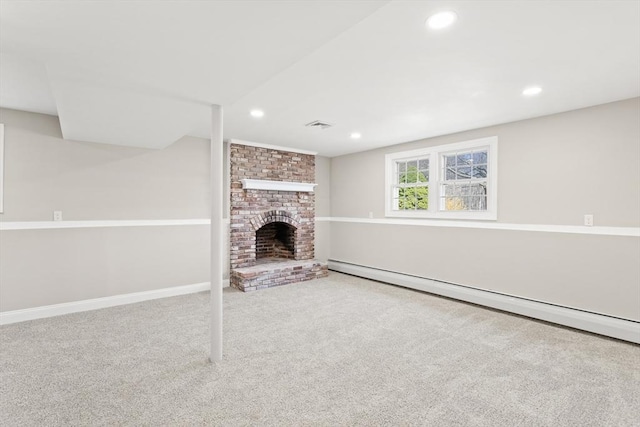 765 S Mammoth Rd, Manchester, NH 03109 - unfurnished living room with carpet floors, a fireplace, baseboard heating, and recessed lighting