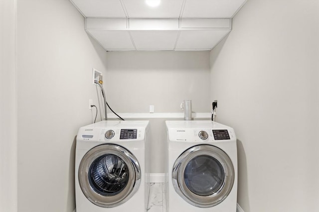 765 S Mammoth Rd, Manchester, NH 03109 - washroom featuring laundry area and separate washer and dryer