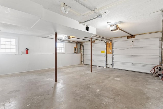 765 S Mammoth Rd, Manchester, NH 03109 - garage with a garage door opener