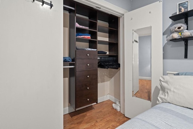 bedroom featuring light wood-type flooring