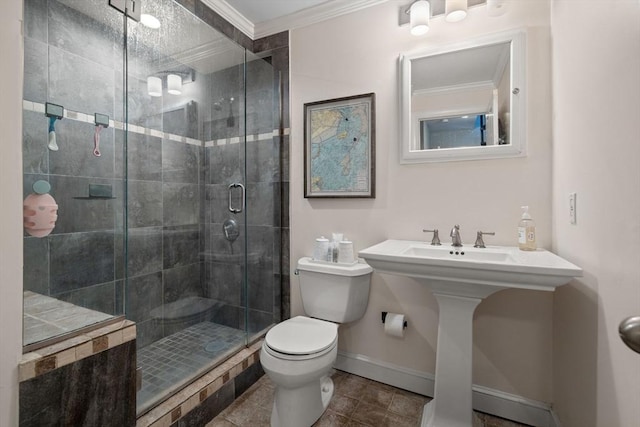 bathroom featuring tile patterned floors, toilet, walk in shower, and crown molding