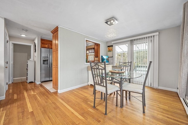 239 Upper County Rd, Dennis, MA 02660 - dining room with light wood-style floors and baseboards