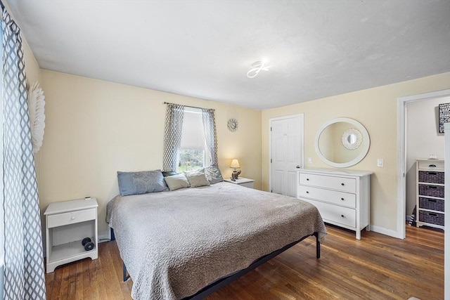 239 Upper County Rd, Dennis, MA 02660 - bedroom with baseboards and wood finished floors