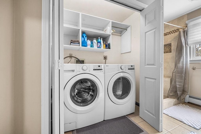 239 Upper County Rd, Dennis, MA 02660 - clothes washing area featuring tile patterned flooring, independent washer and dryer, and a baseboard heating unit