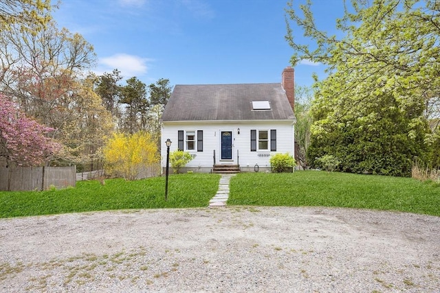 239 Upper County Rd, Dennis, MA 02660 - cape cod house with a chimney