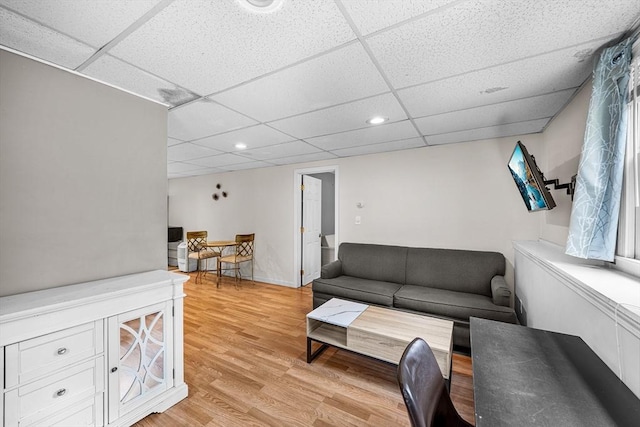 239 Upper County Rd, Dennis, MA 02660 - living room featuring a drop ceiling, light wood-type flooring, and recessed lighting